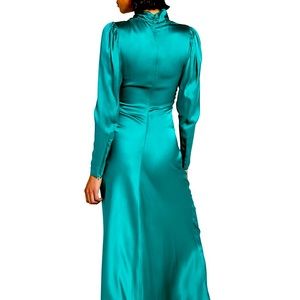 Glamorous satin-finish design with ruched detailing for a body-hugging fit.